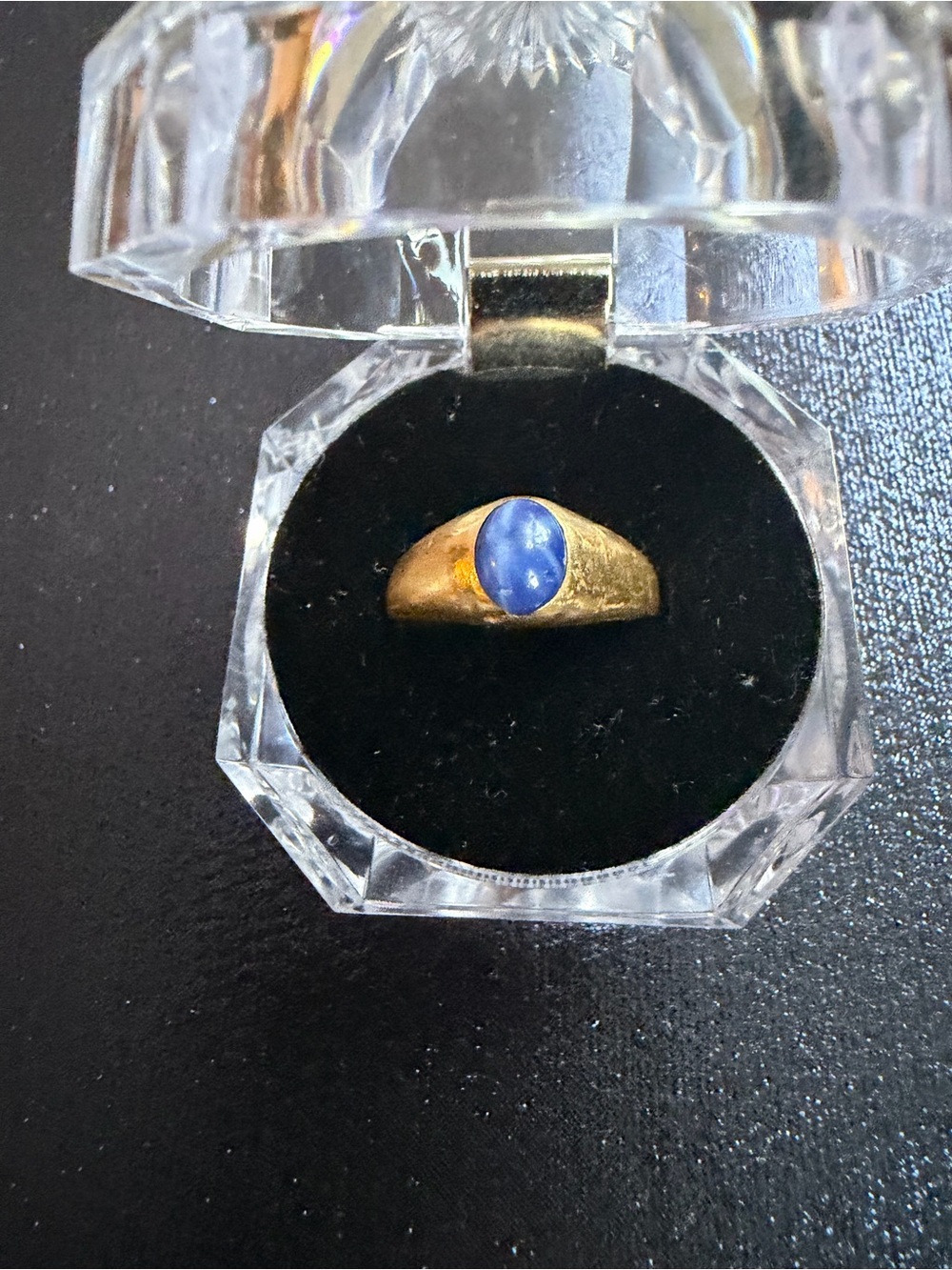 Vintage natural blue star sapphire ring set in a 14K yellow gold band